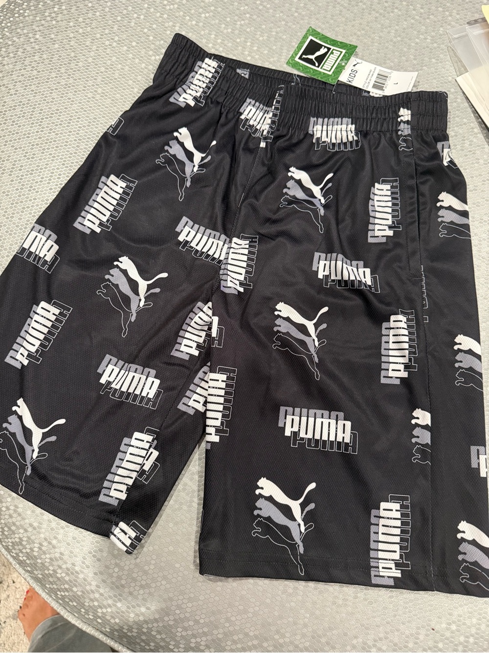 Puma youth Black Shorts with White Logo Print and Green Brand Tag